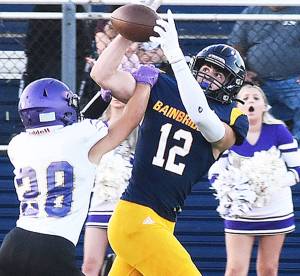 Nicholas Zeller-Singh/Kitsap News Group Photos
Luca Sheltens catches a 37-yard pass on the Spartans first play.