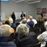 Nancy Treder/Kitsap News Group Photos
David Knight of Bainbridge Island and city manager Blair King speak at a community discussion on KKOL AM Radio Interference and electronic device malfunctions.