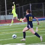 Bainbridgess Avery Pujolar dribbles down the sideline before scoring.