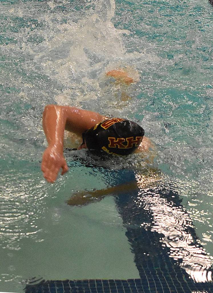 Kingston's Lilia Manges wins the 100-yard freestyle.