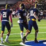 Spartan Jack Grant celebrates scoring a touchdown.