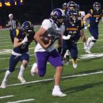 Viking Carter Dungy runs down the sideline for a touchdown.
