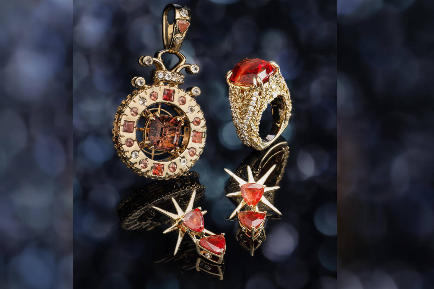 True North Compass pendant, ring and earrings by Robin Callahan Designs, featured in Lapidary Journal. Oregon sunstone cut by lapidary artist Dalan Hargrave. Photographed by Daniel Zetterstrom.