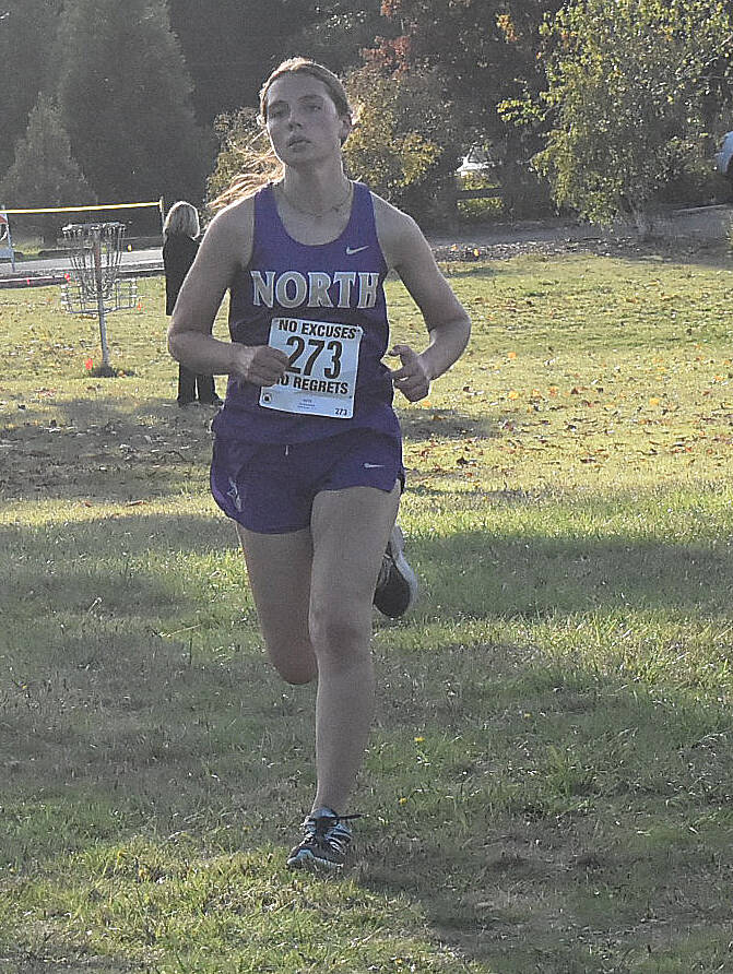 North Kitsaps Kendall Becker is the first Viking to cross the finish line.