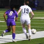 Spartan Avery Pujolar dribbles the ball past North Kitsaps Aydeline Jueco.