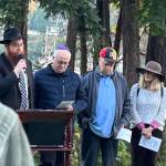 Rabbi Mendy Goldshmid speaks to the community Oct. 12.