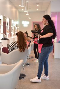 Nancy Treder/Kitsap News Group
A blo-er styles a guests hair at Blo Blow Dry Bar in the Safeway Center on High School Road.