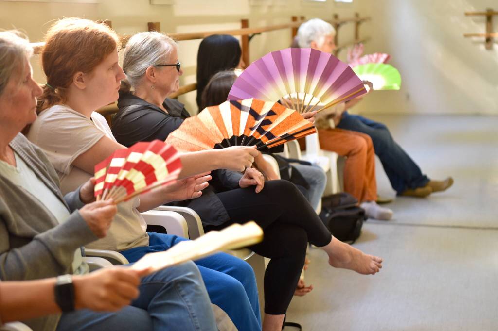 Attendees learn to use a sensu fan.