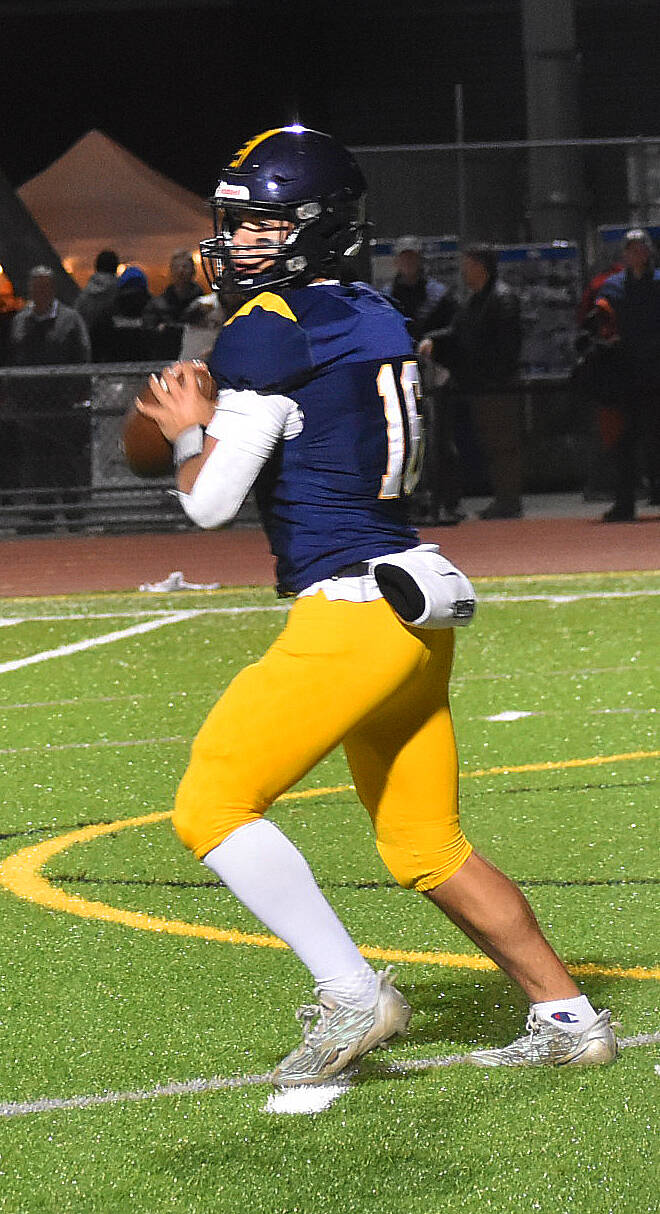 Bainbridge quarterback Jack Grant throws and scrambles for a pair of touchdowns.