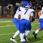 Jalin Littleraven-Oliver of Bremerton takes the handoff for a big gain.