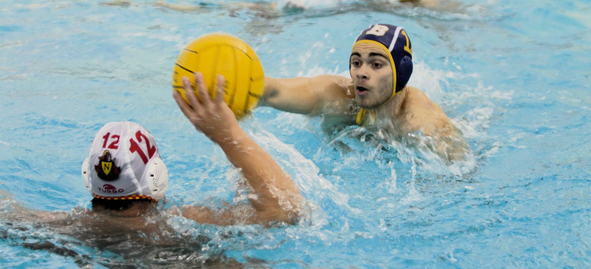 Junior Elias Dean works to stop the advancement of the ball toward his goal.