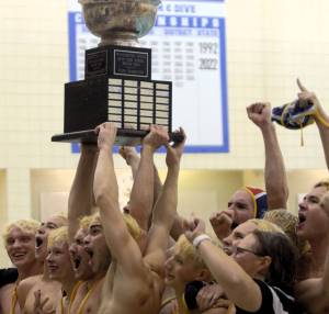 Elisha Meyer/Kitsap News Group Photos
The Bainbridge Spartans hoist the championship trophy after beating Newport 12-6 in the title match.