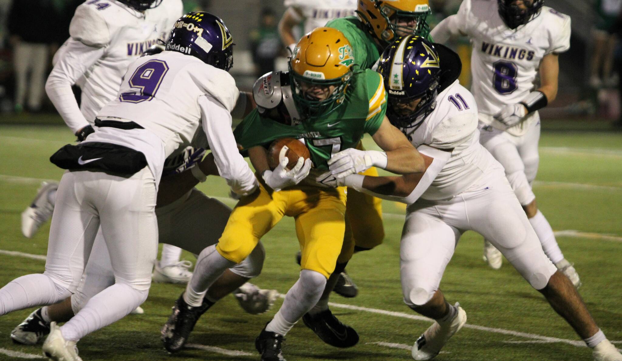 Elisha Meyer/Kitsap News Group
Seniors Kaden Pickard and Ben Gomez team up to bring down a Thunderbird runner.