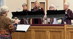 Interfaith service courtesy photo
The Rolling Bay Hand Bell choir performs at the Interfaith service.