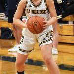 Carlyn Moore scores seven points against Peninsula.