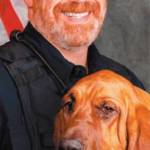 K-9 officer Kurt Enget, with his dog Whitney, died of COVID.