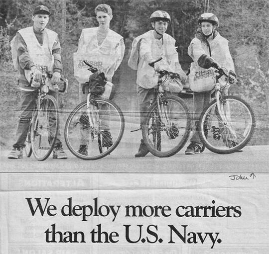 John Thorne, far right, was featured in a Review ad for newspaper carriers in this 1993 photo.