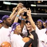 Rudy Sharar, center, celebrates with his team after the Huskies won the Pac-10 tourney.