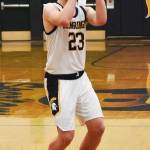 Spartan Calum McCarter nails the game-tying three-pointer.