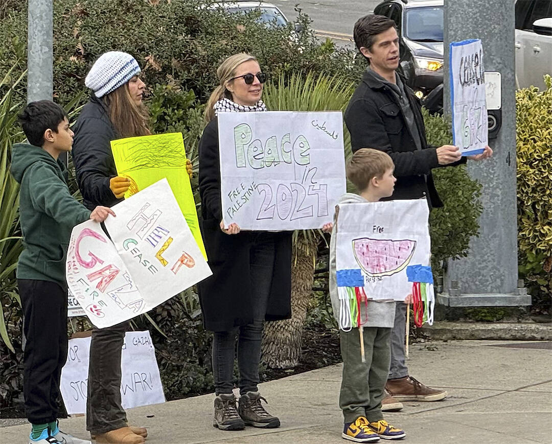 Leah Leicester courtesy photo
A group holds signs on Bainbridge Island protesting the fighting in Gaza.