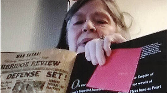 File Photo
Mary Woodward shows headlines from her parents papers during a talk on journalism a few years ago.
