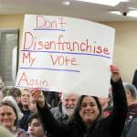 Elisha Meyer/Kitsap News Group Photos
Several signs were brought into the packed Kitsap County courtroom Jan. 16.