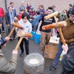 Another hands-on activity was using mallets to mash the mochi dough.