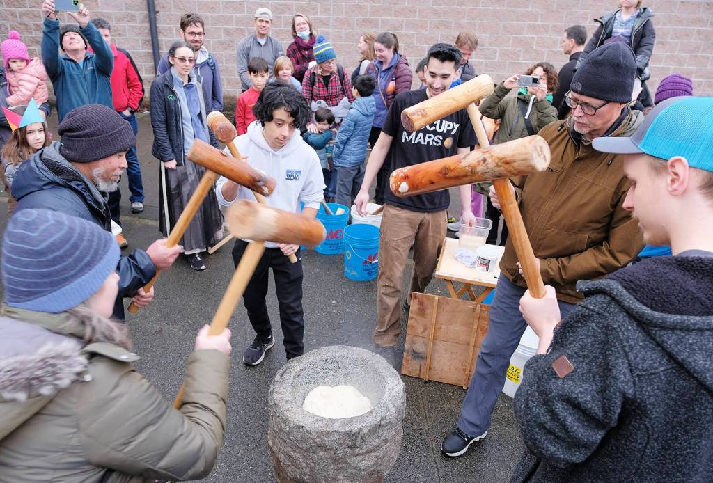 Another hands-on activity was using mallets to mash the mochi dough.