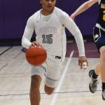 NKs Jordan Williams dribbles down the court in transition.