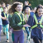 Molly Wetherwick/Kitsap News Group Photos
Riley Lambert, Nikka Heiskanen and Amelie Hill of Go Run Bainbridge jog during a recent practice.