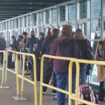 Walk-on passengers line up for the next ferry inside the comforts of the new terminal.