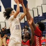 Elisha Meyer/Kitsap News Group
Senior Harry Davies puts up a shot in the second half against Renton.
