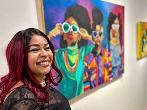 BIMA courtesy photos
Fancy Vargas next to some of the art at the display.