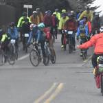 Several cyclists ride alongside each other during Chilly Hilly.
