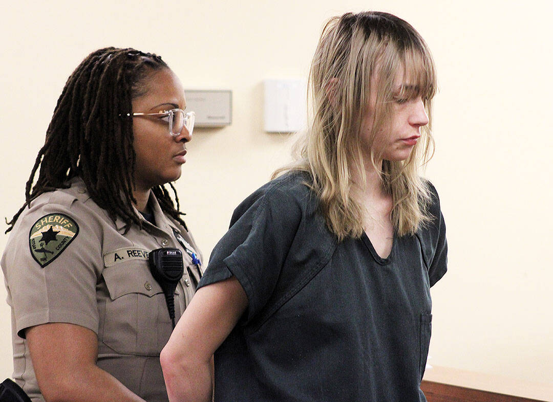 Elisha Meyer/Kitsap News Group
Baylijo Williams is placed back in handcuffs at the conclusion of her arraignment hearing March 6.