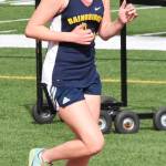 Spartan Evelyn Shutske competes in the 4 x 400 relay.