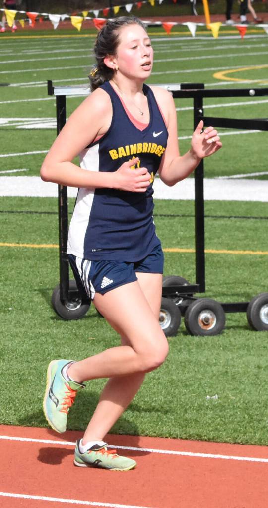 Spartan Evelyn Shutske competes in the 4 x 400 relay.