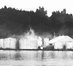 The Wyckoff plant in the 1980s. The container at left held up to 1 million gallons of creosote.