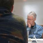 Steve Powell/Kitsap News Group photos
Bainbridge Island City Councilmember Jon Quitslund reacts to the announcement that the Historic Preservation Commission was resigning en masse.