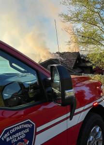 BIFD courtesy photo
A Bainbridge Island fire response vehicle at the house fire in Crystal Springs April 16.