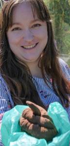 Damon Williams/Kitsap News Group photos
Rachel Bowen handed out piles of fake poo to throw at a target to share the importance of properly disposing of such waste to protect the environment.