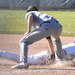 Nicholas Zeller-Singh/Kitsap News Group photos
Bainbridges Braden French dives safely back into first base after a pickoff attempt.