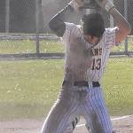 Spartan AJ Larsen shows frustration after being thrown out at third base.