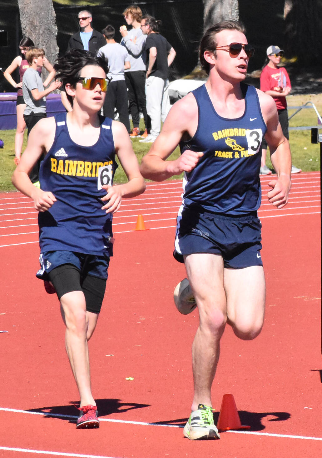 Spartans Ben Crandall and Tyler Dodge race in the 1600 meters.