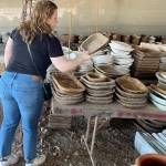Maggie Stephens courtesy photos
Maggie Stephens assesses stoneware at the Round Top Antique Show in Carmine, TX, in March.