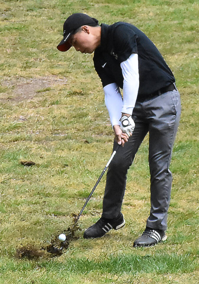 Viking Ryan Hendricks hits the ball down the fairway.