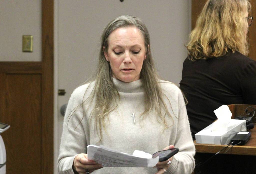 Crystal Schaap turns to return to her seat after delivering her remarks.