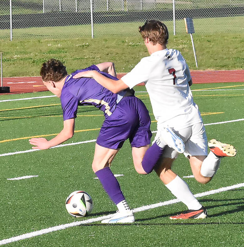 Ethan Peck battles for the ball near the goal for the Vikings.