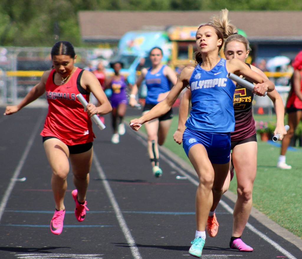 Olympic 4x200 anchor Mia Talarico crosses the finish line.