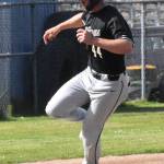 Viking Tate Stearns heads to home plate.